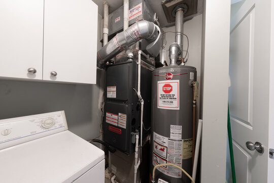 Detroit, Michigan -USA- May 9, 2025: home has been updated with a new furnace and hot water tank installed in the basement