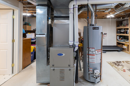 Detroit, Michigan -USA- May 9, 2025: home has been updated with a new furnace and hot water tank installed in the basement