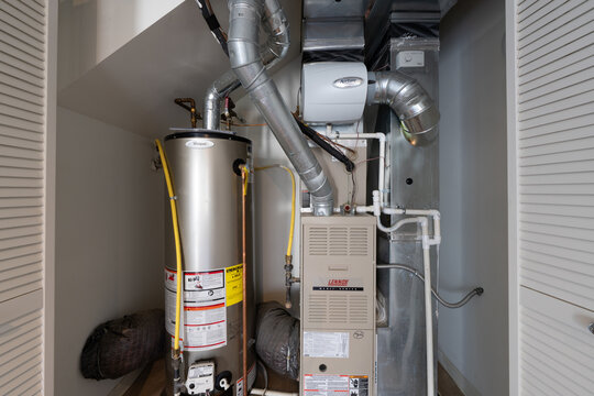 Detroit, Michigan -USA- May 9, 2025: home has been updated with a new furnace and hot water tank installed in the basement