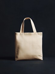 The image shows a light beige cotton tote bag with two handles against a black background.