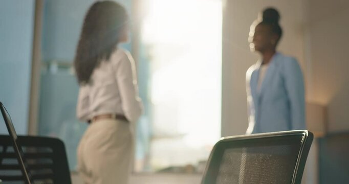 Office, business people and blur with handshake for agreement, introduction and opportunity for job. Workplace, women and hr manager with shaking hands for welcome, thank you and success for hiring