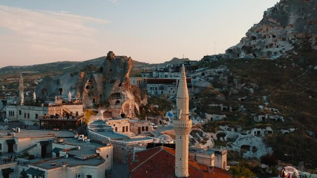 The Famous Uchhisar Cave Castle In Cappadocia, At Sunset, Turkey, Aerial View