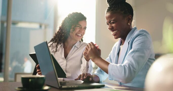Laptop, celebration and business women high five for target, milestone or finish project in office. Team, happy workers and success with tablet for achievement recognition, collaboration or good news