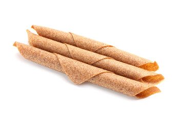 Delicious fruit leather rolls on white background