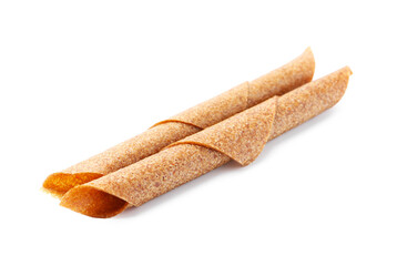 Delicious fruit leather rolls on white background
