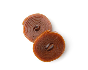 Delicious fruit leather rolls on white background, top view