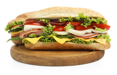 Tasty baguette sandwiches with ham, cheese and vegetables isolated on white