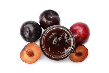 Sweet jam in jar and plums isolated on white, top view
