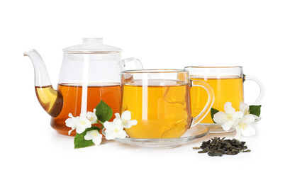 Aromatic jasmine tea in glass cups, teapot, flowers and leaves isolated on white