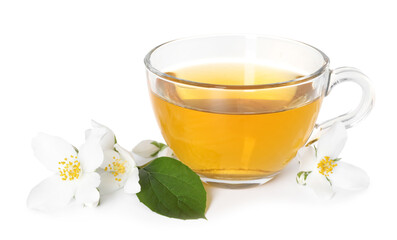 Aromatic jasmine tea in glass cup, flowers and green leaf isolated on white