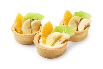 Tartlets with fruits isolated on white. Delicious dessert