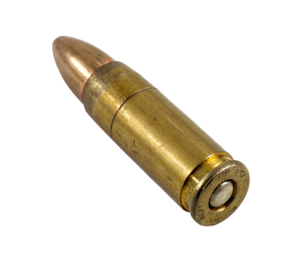Close up of a brass rifle bullet ammunition for gun firearm shooting range and military equipment weapon
