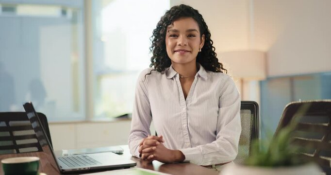 Face, laptop and happy business woman in office for writing news article, report or research. Computer, smile and portrait of confident journalist, professional and creative employee working in Spain