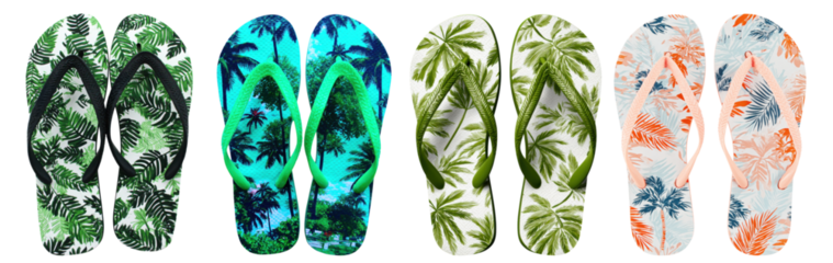 Four pairs of flip-flops with tropical leaf patterns in varying colors arranged side by side.