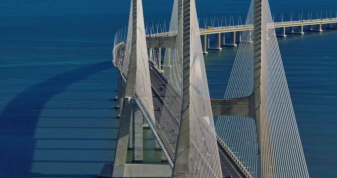 Aerial view of Vasco da Gama bridge crossing the Tagus river in Lisbon, Portugal. Modern design
