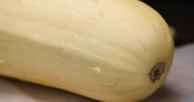 white squash with a hard peel, ripe white squash on the kitchen table before cooking