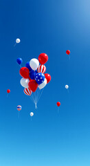 Floating 4th of July Balloons in Clear Blue Sky | Vertical Layout