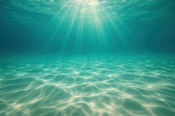 Serene underwater ocean scene with sunbeams penetrating crystal blue waters