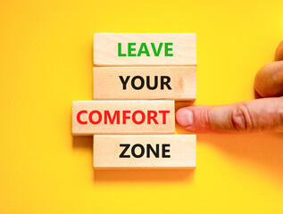 Leave your comfort zone symbol. Concept words Leave your comfort zone on beautiful wooden blocks....