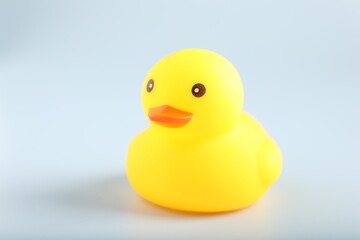 One cute rubber duck on white background, closeup