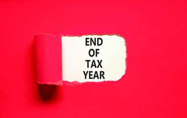 End of tax year symbol. Concept words phrase End of tax year on beautiful white paper. Beautiful...