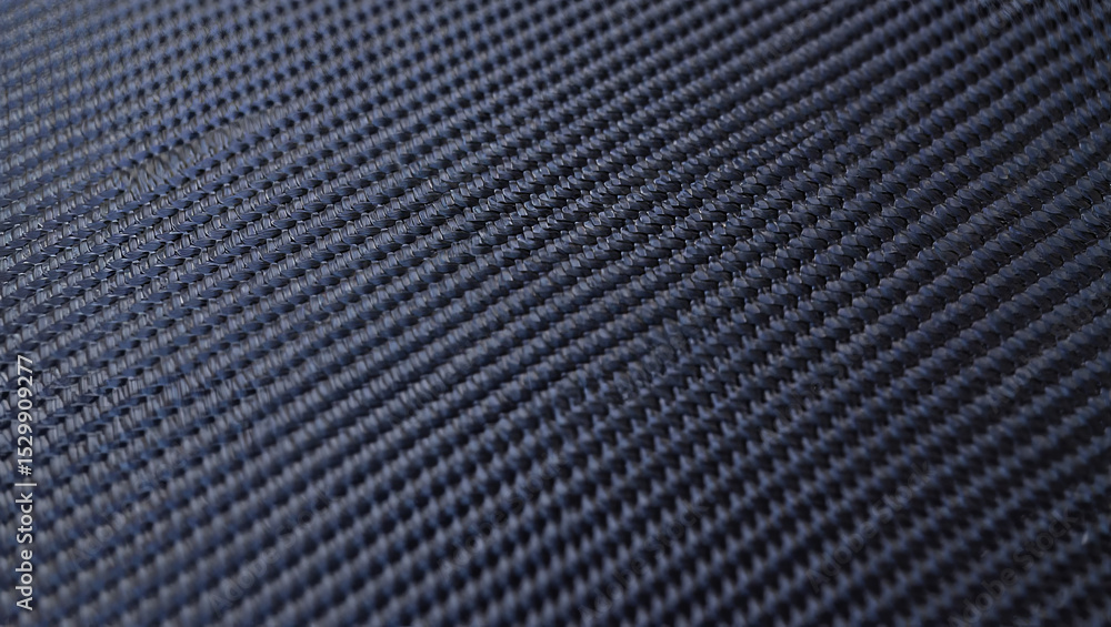 Poster this close-up displays a detailed woven fabric in dark blue, emphasizing its smooth texture and intr