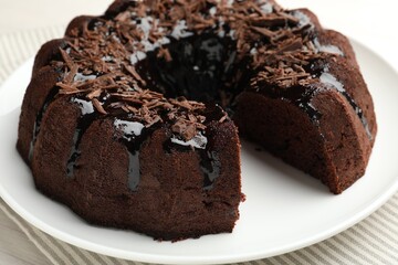 Delicious chocolate bundt cake on table, closeup