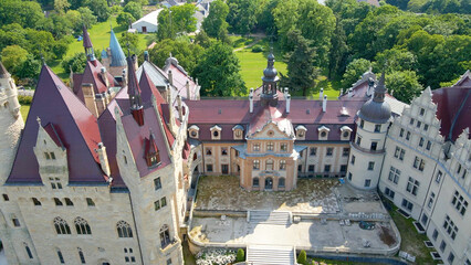 Moszna Castle fly over landscape view from above architecture near the village Moszna Poland