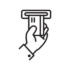 Hand inserting credit card into ATM machine slot