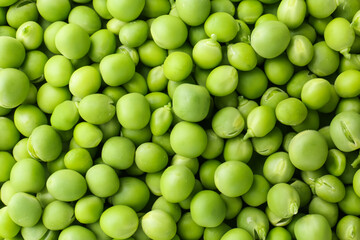 Pile of fresh green peas as background, top view