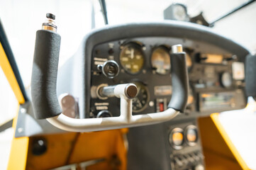 Fototapeta premium Dashboard yellow airplane glider in hangar. 