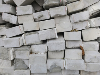 heap of grey colored bricks