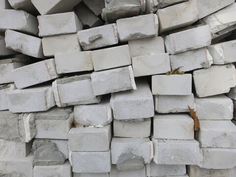 Fototapeta heap of grey colored bricks