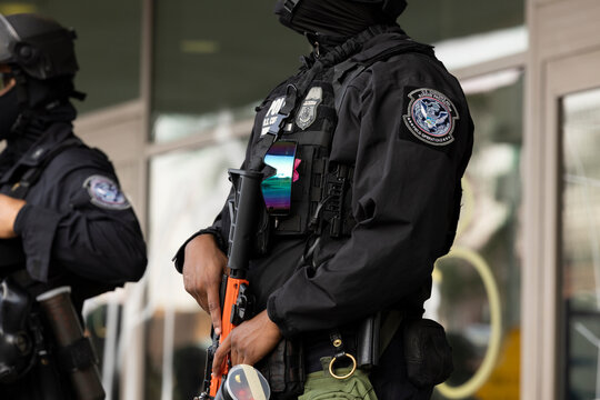 Los Angeles, California, USA - June 10, 2025: U.S. Customs and Border Protection (CBP) field officers guard a federal building during ICE deportation protests in Downtown LA. 