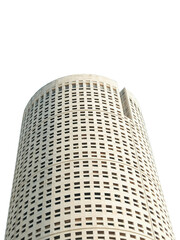 White cylindrical tower with repetitive window patte