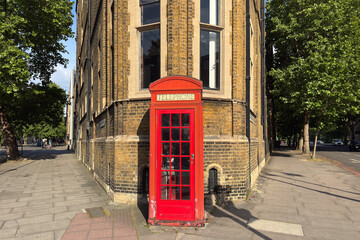 Red phone booth in London. United Kingdom, Europe.