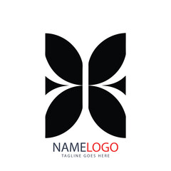 Obraz premium Abstract vector logo design with a butterfly and four-leaf clover for luck