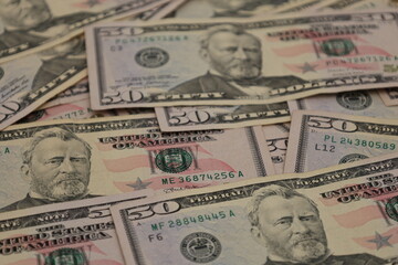 closeup 50 fifty us dollar bills background