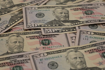 closeup 50 fifty us dollar bills background