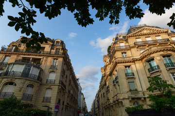 Paris, typical facades and windows, beautiful buildings, with old zinc roofs