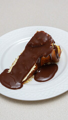 Delicious and Indulgent Cheesecake with Rich Chocolate Fudge Sauce Topping for Dessert Lovers