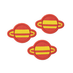 Fototapeta premium Three embroidered patches feature red planet with yellow rings, resembling stylized Saturn. patches are arranged on plain background, showcasing their vibrant colors and playful design