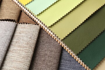 Samples of different fabrics as background, closeup