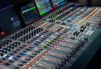 Broadcasting console with lots of switches. Selective focus image of dashboard - mixer board.