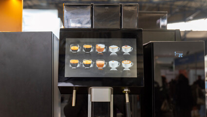 Menu selection on touchscreen of automatic coffee vending machine