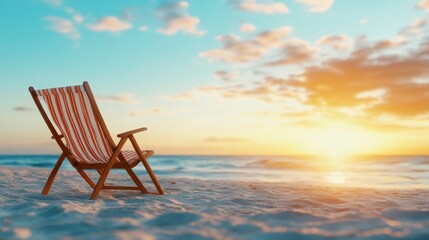An inviting beach chair sits on the sand, facing a stunning sunset over the ocean, evoking feelings of relaxation and peace in a tropical paradise.
