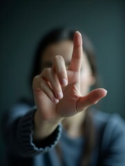 Female hand close-up, finger touches the screen
