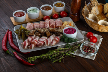 Bacon with croutons and horseradish on wooden background