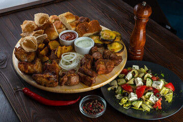 Meat set on wooden background