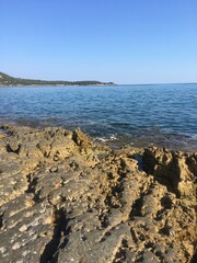 Sea and yellow rocks